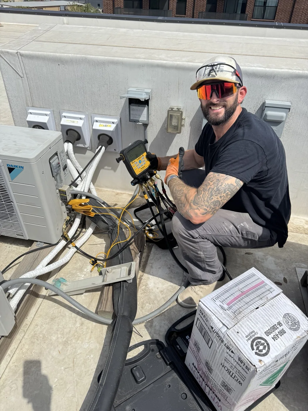 H&H service work on an air conditioning system
